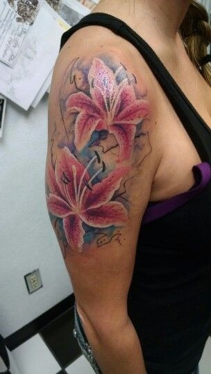 Painterly Lily Bloom Tattoo, a tattoo design rendered in clean detailed linework for the back.