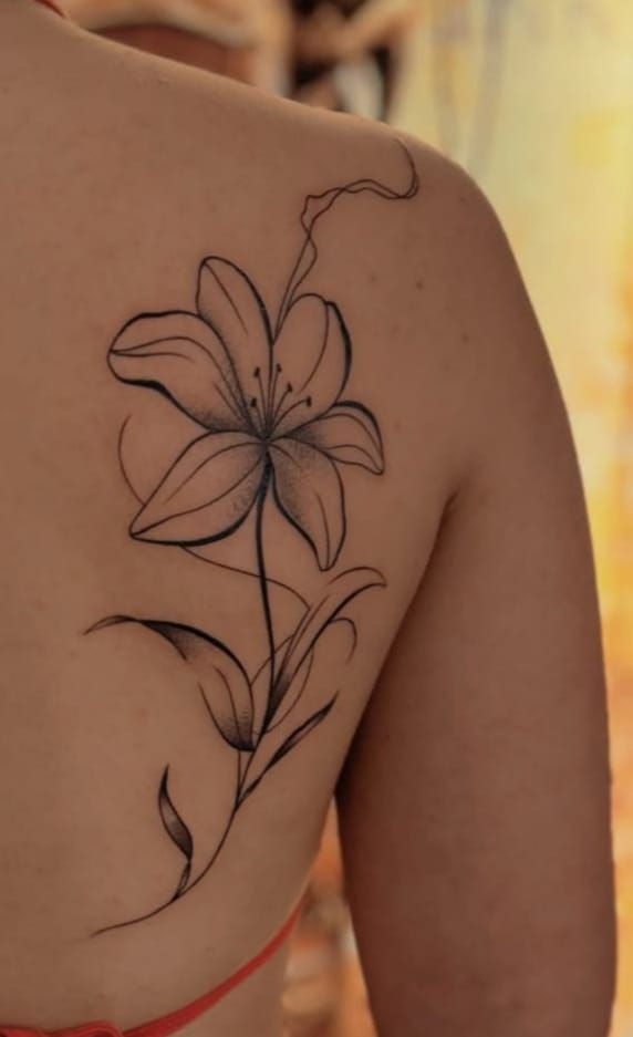 Single Lily Line Tattoo, a tattoo design rendered in delicate fine-line.