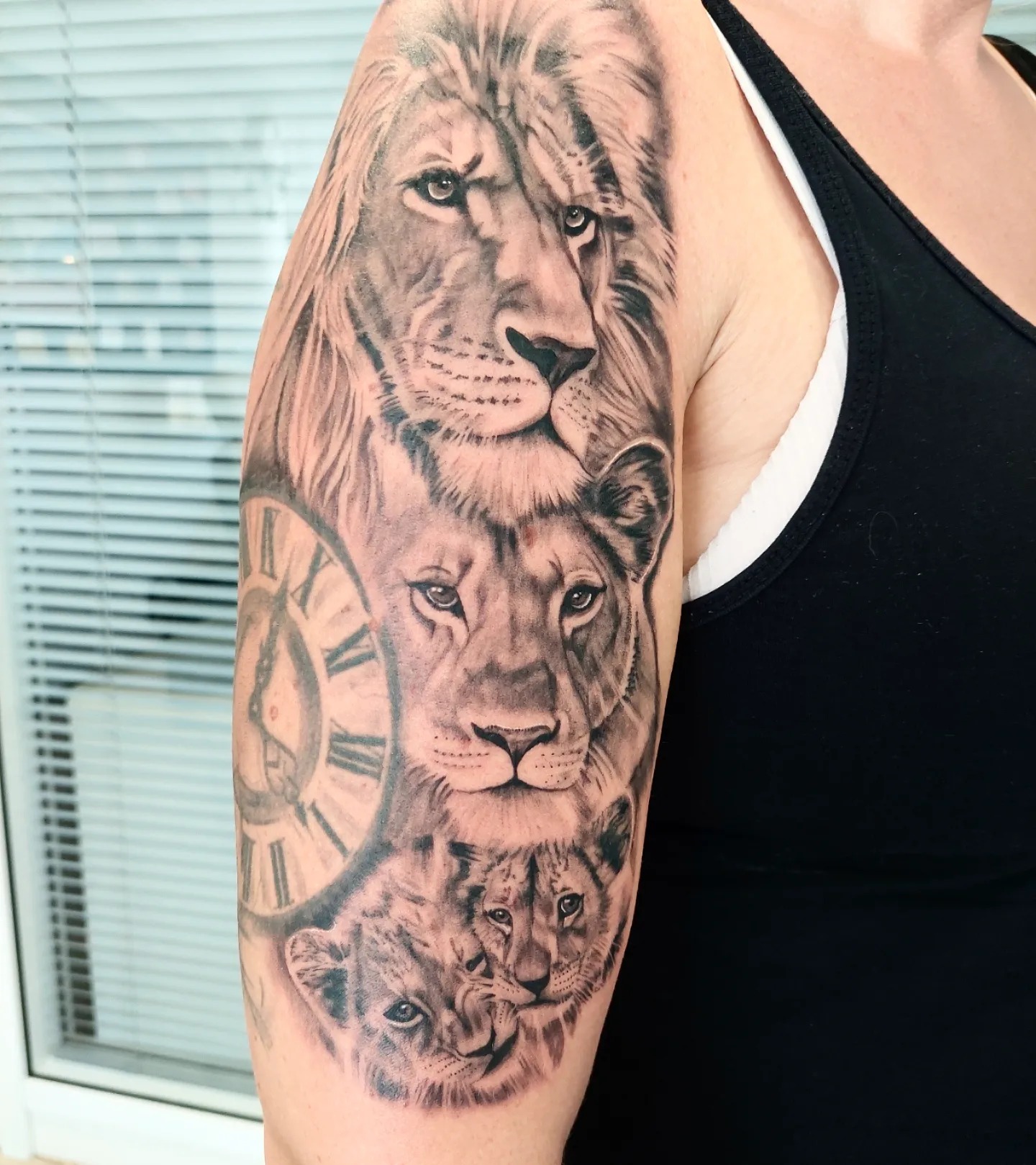 Lion Family and Roman Clock Tattoo Tattoo Design
