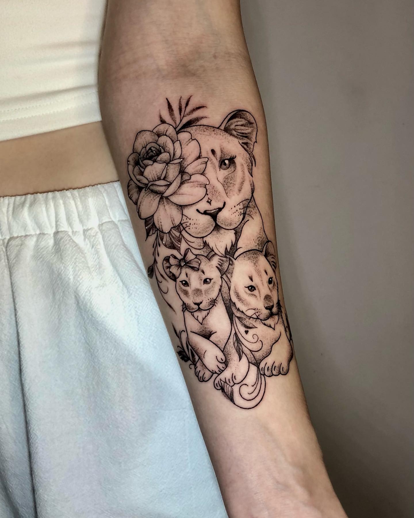Lioness and Twin Cubs Floral Tattoo Tattoo Design