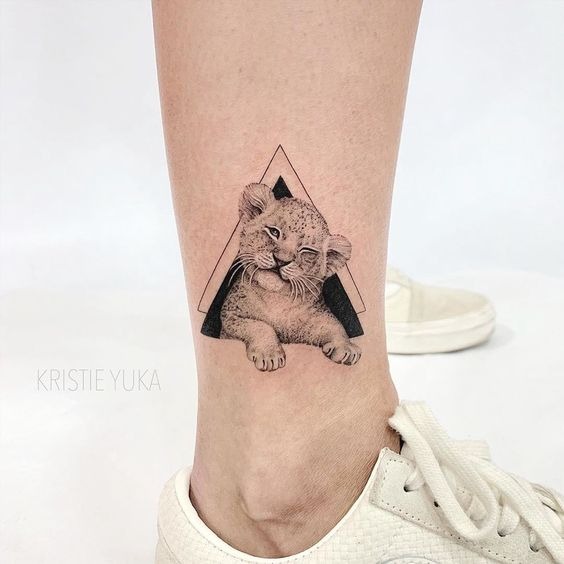 Lion and Lioness Tattoo with Floral Accents Tattoo Design
