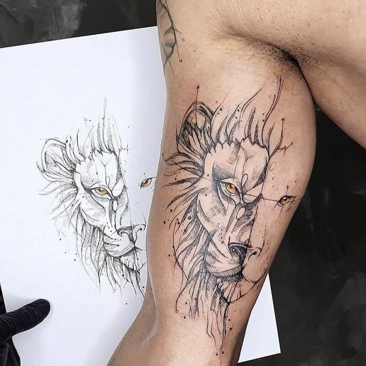 Lion Eyes Tattoo with Crown Tattoo Design