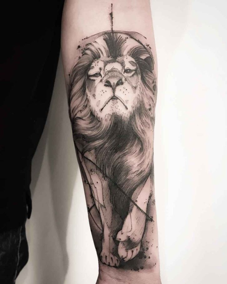 Side Facing Lion Head Tattoo on Leg Tattoo Design