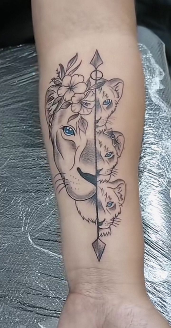 Arrowed Trio: Lioness with Blue-Eyed Cubs Tattoo Design