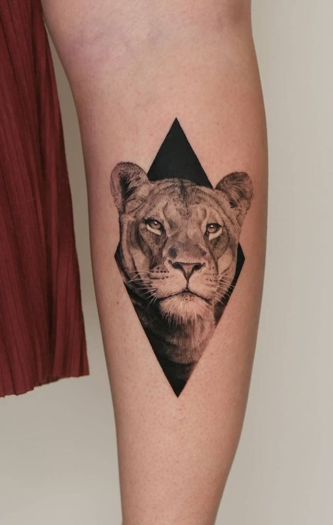 Diamond-Shadow Lioness Calf Piece Tattoo Design