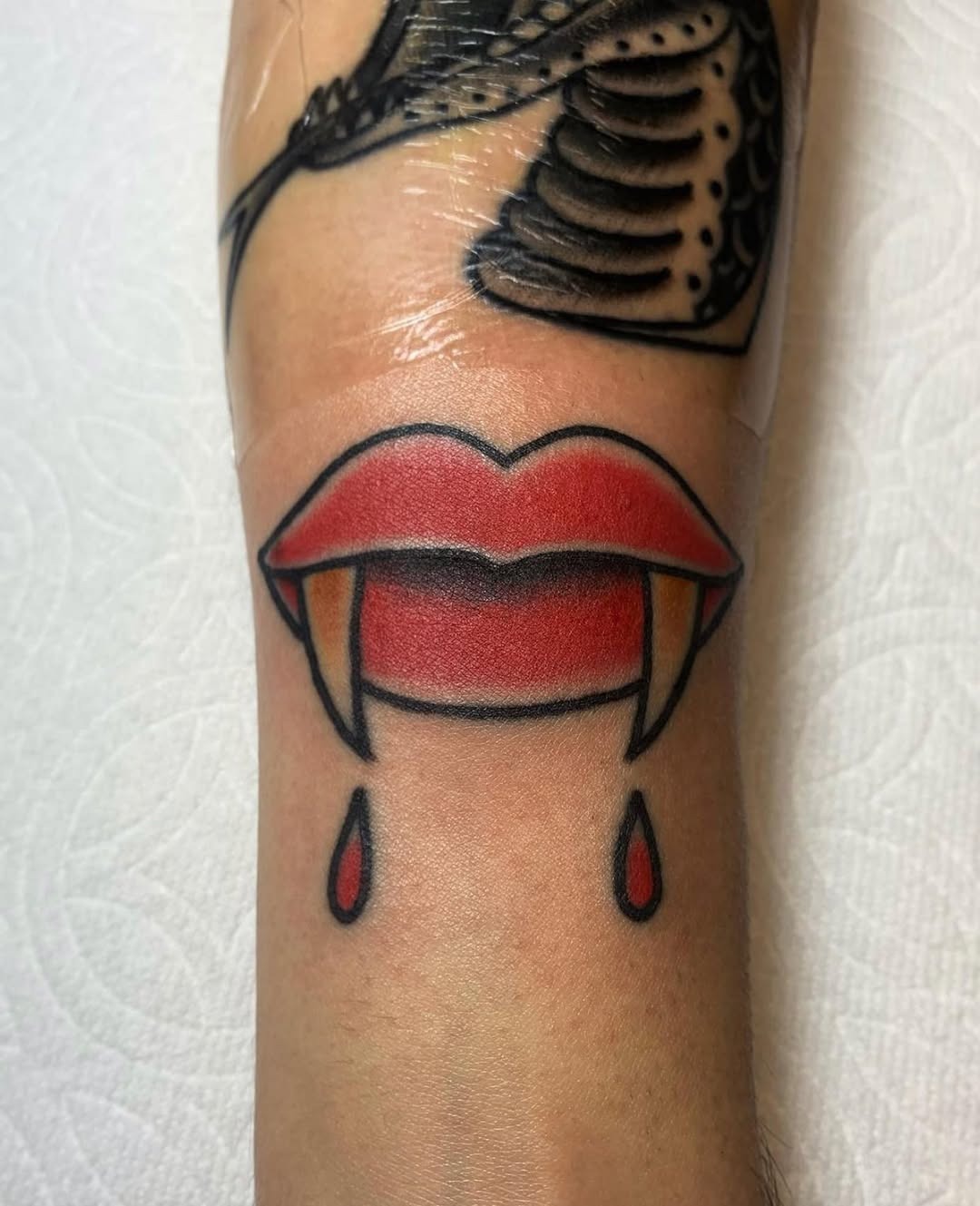 Bold Vampire Lips with Edgy Fangs Design Tattoo Design