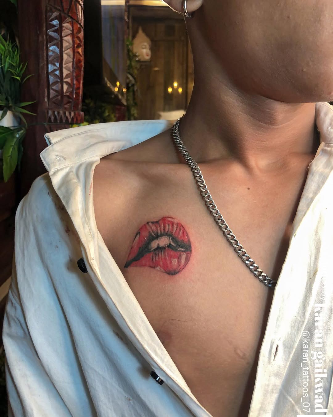 Vibrant Lip Tattoo on Chest Tattoo Design