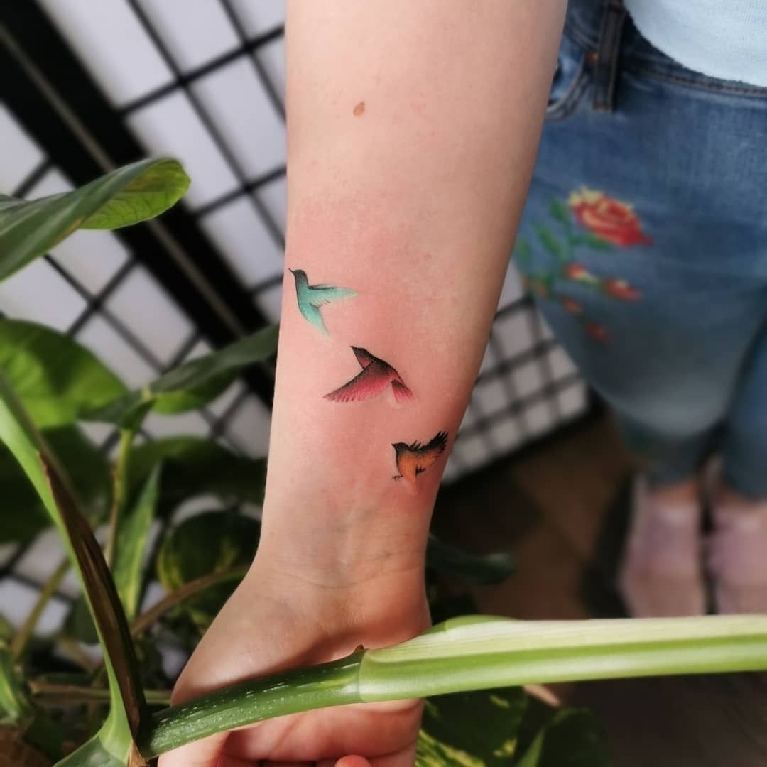 Colorful Flying Birds Tattoo Tattoo Design