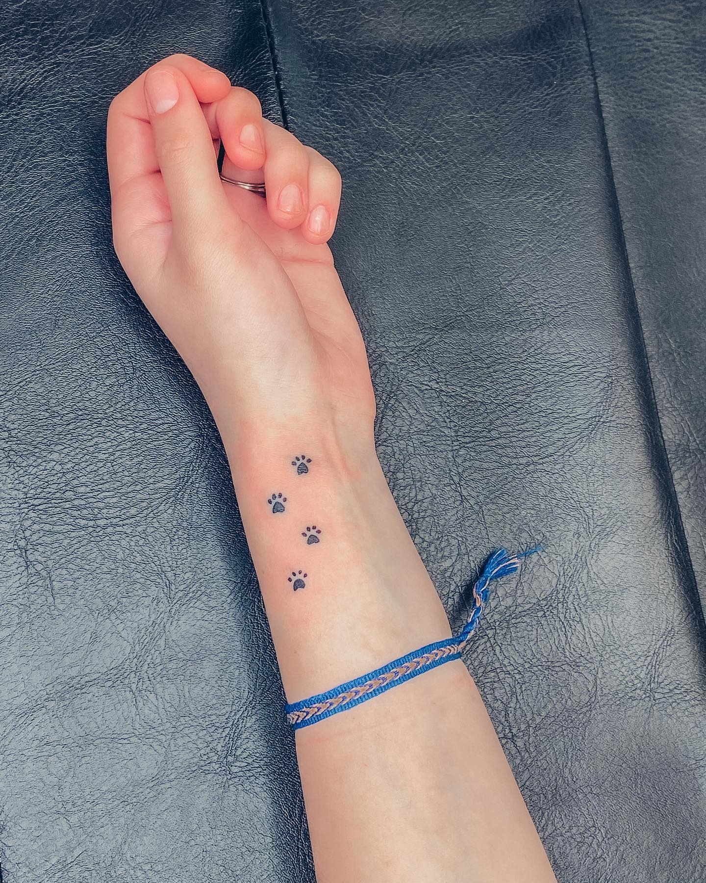 Tiny Paw Print Trail Tattoo Tattoo Design