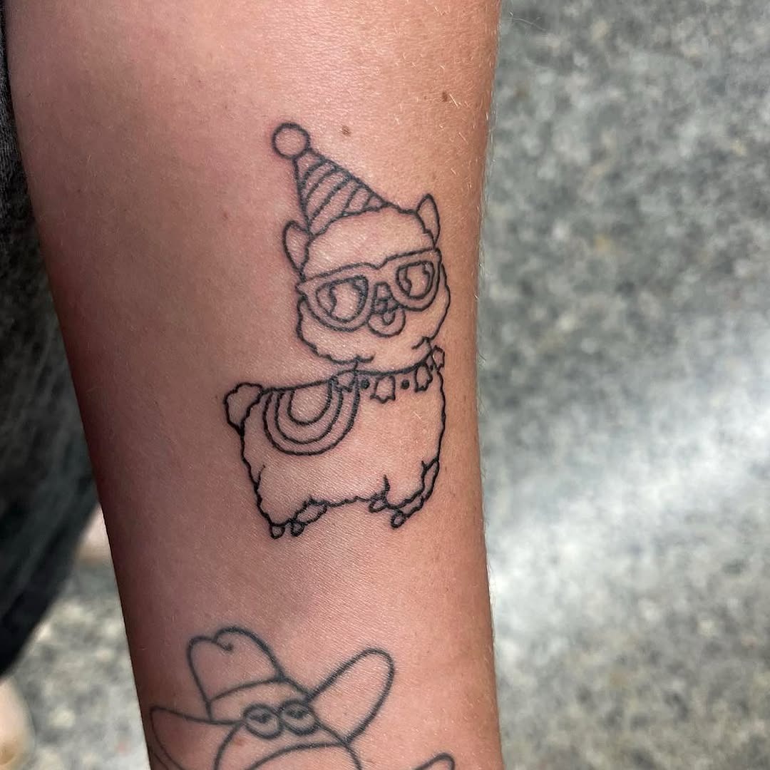 Adorable llama tattoo with playful vibe Tattoo Design