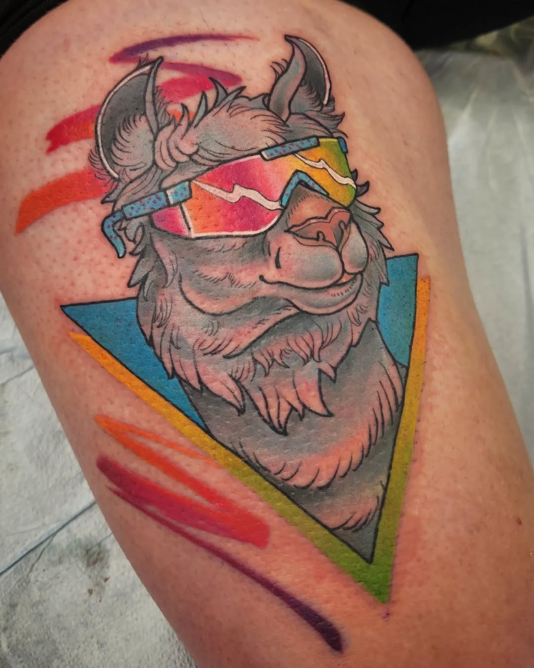Colorful llama tattoo with vibrant geometric elements Tattoo Design