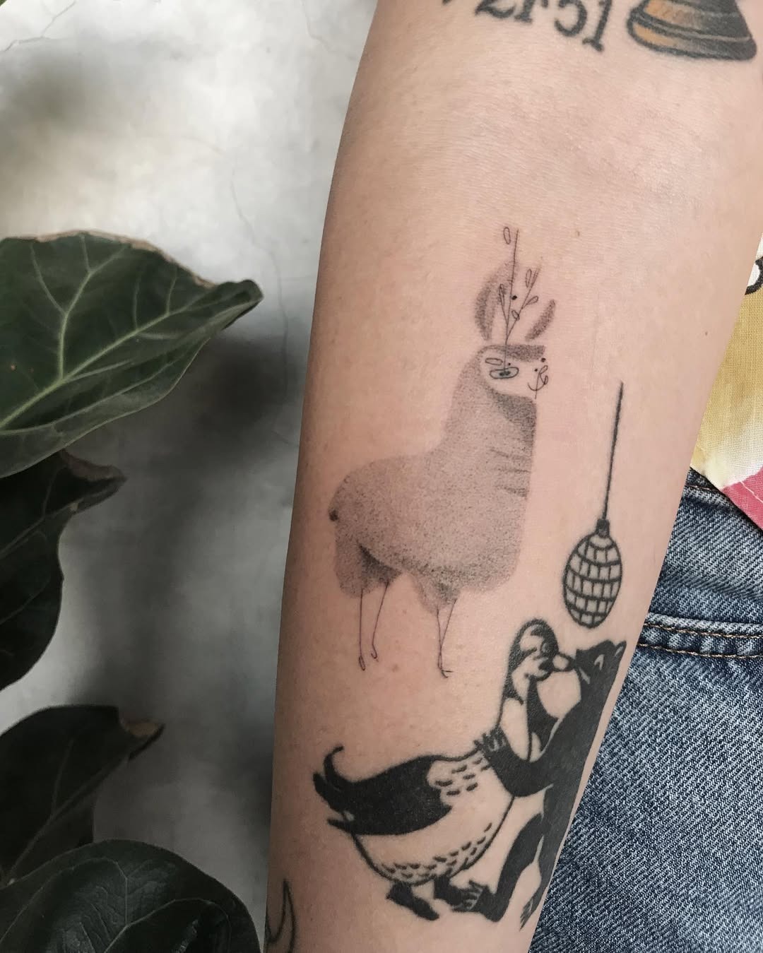 Quirky llama tattoo with whimsical details Tattoo Design