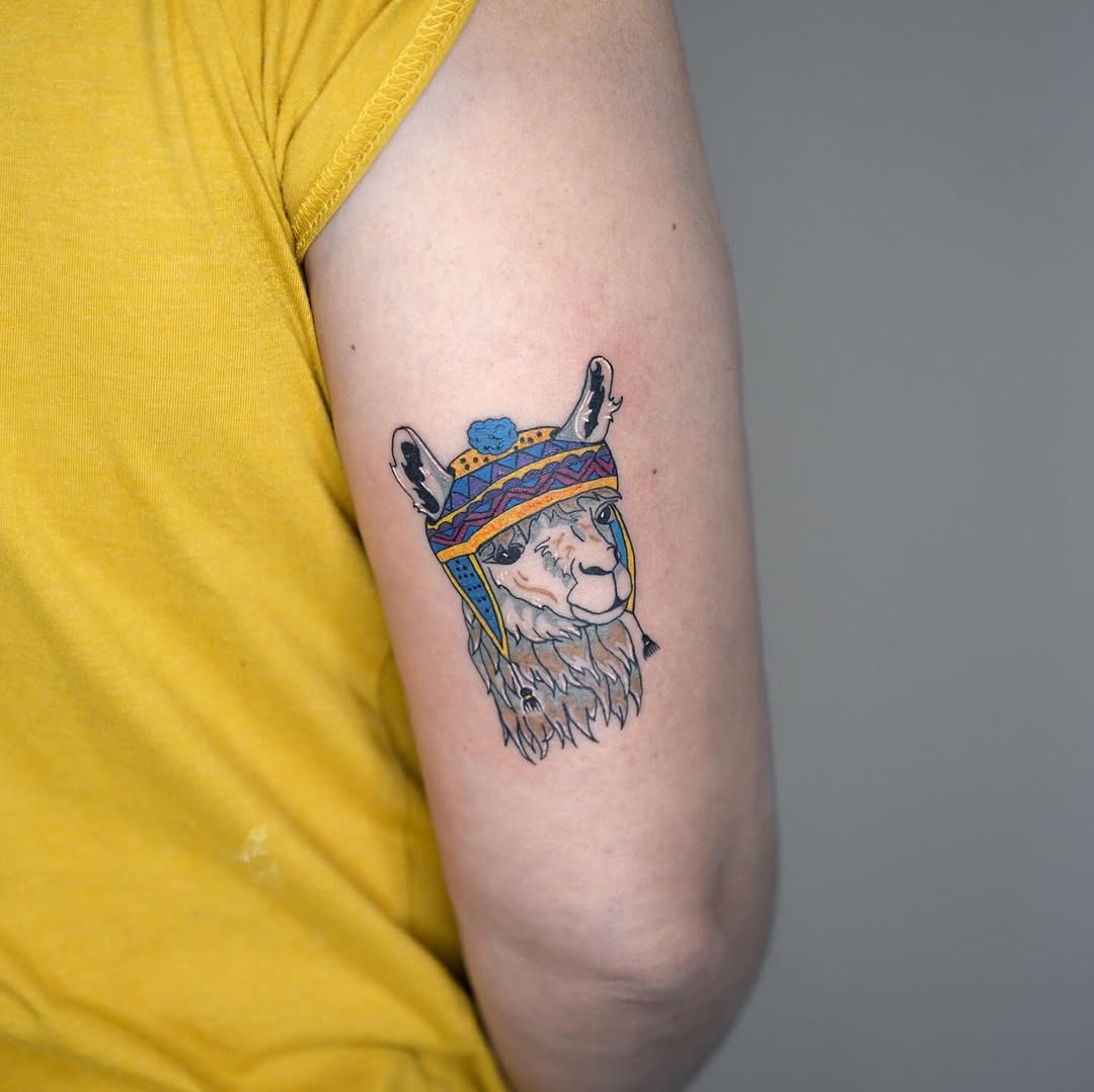 Vibrant llama tattoo with cultural elements Tattoo Design