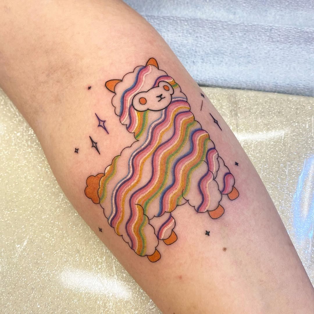 Vibrant llama tattoo with playful rainbow hues Tattoo Design