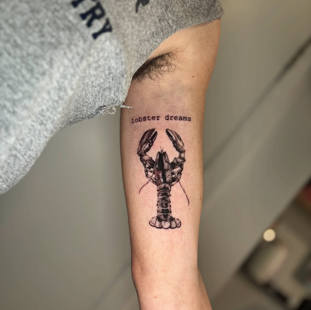 Artistic lobster tattoo with unique inscription Tattoo Design