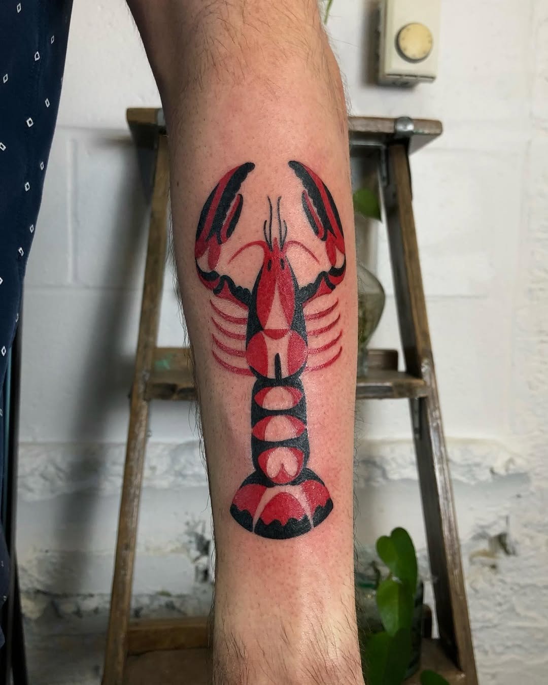 Bold Red Lobster Tattoo with Black Accents Tattoo Design