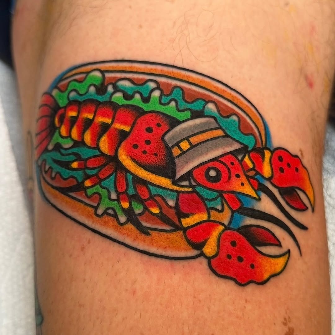 Colorful lobster tattoo with a playful twist Tattoo Design