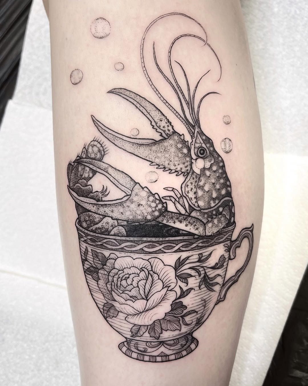 Unique lobster tattoo in decorative teacup Tattoo Design