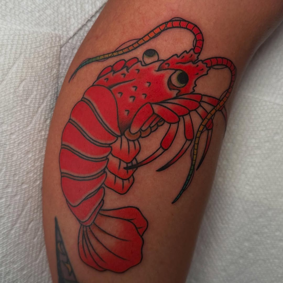 Vivid lobster tattoo with bold colors and details Tattoo Design