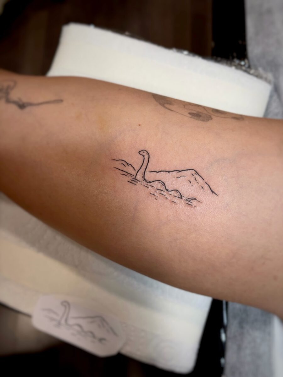 Charming minimalist Loch Ness Monster tattoo Tattoo Design