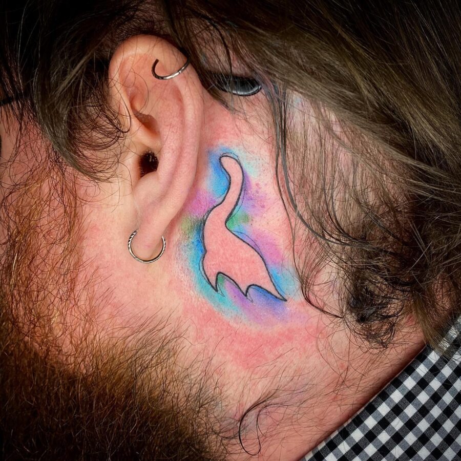 Colorful Loch Ness Monster Ear Tattoo Tattoo Design