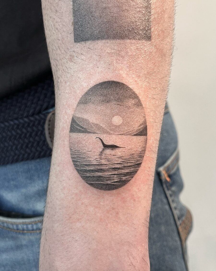 Elegant loch ness monster tattoo in serene setting Tattoo Design