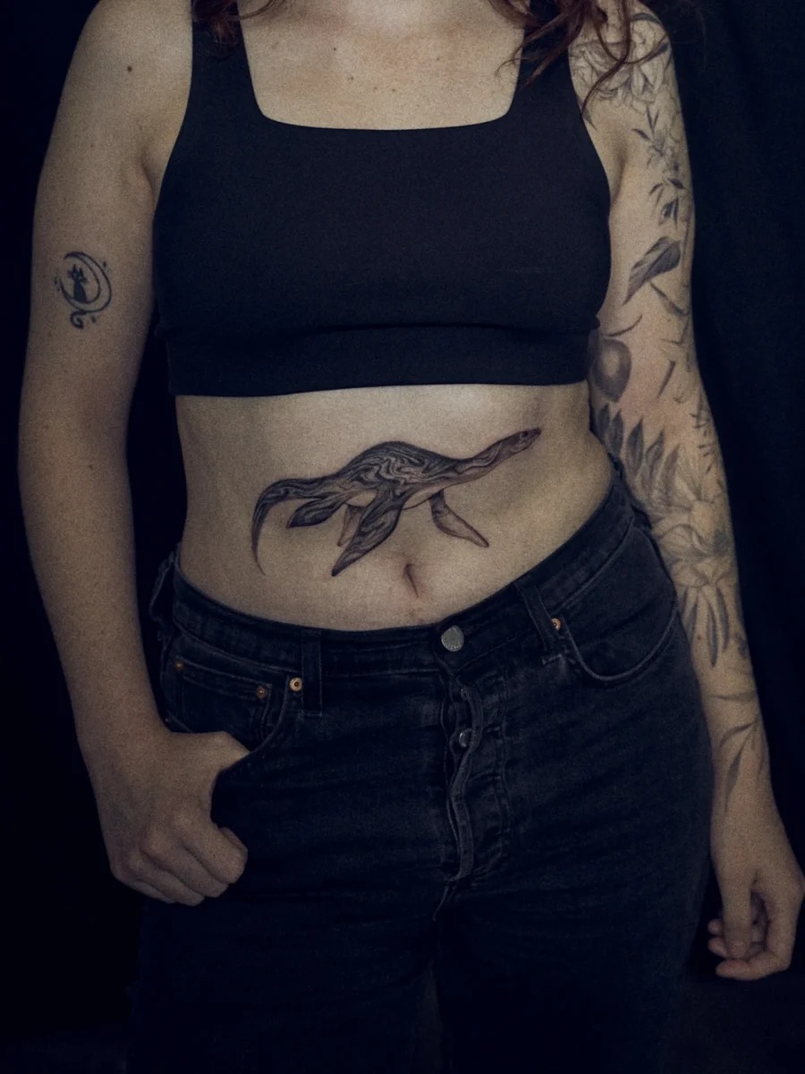 Elegant Loch Ness Monster Tattoo on Stomach Tattoo Design