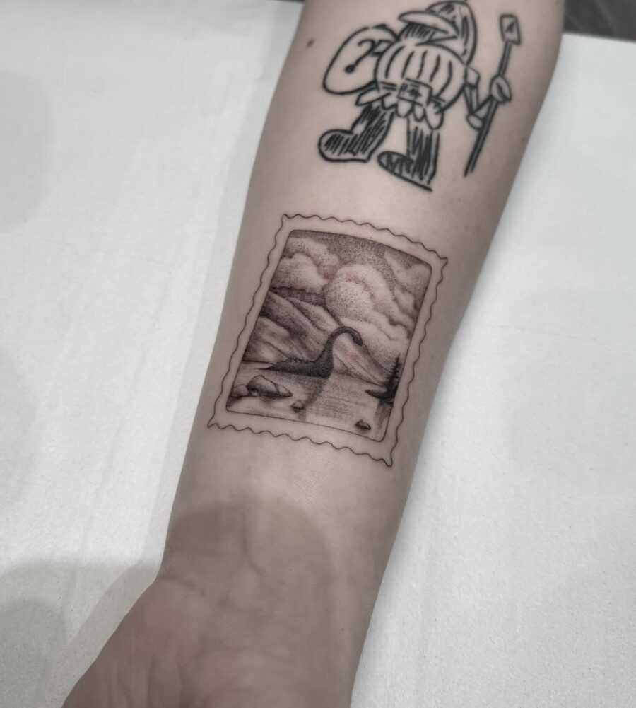 Intricate stamp-style Loch Ness monster tattoo Tattoo Design