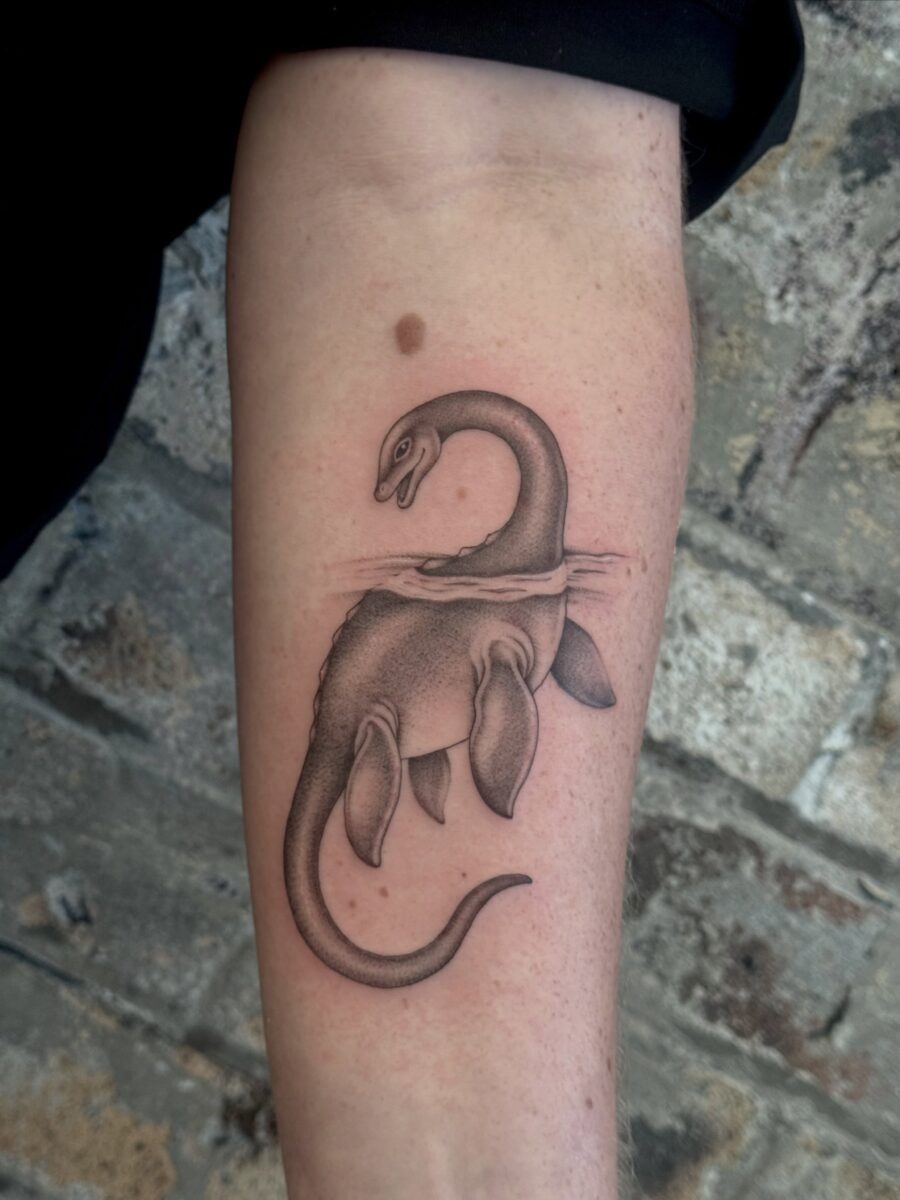 Realistic Loch Ness Monster Inked on Skin Tattoo Design