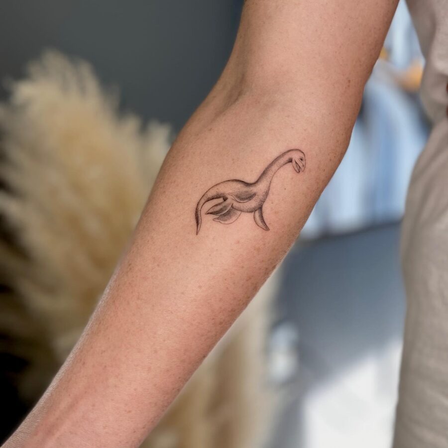 Stylish Loch Ness Monster Arm Tattoo Design Tattoo Design