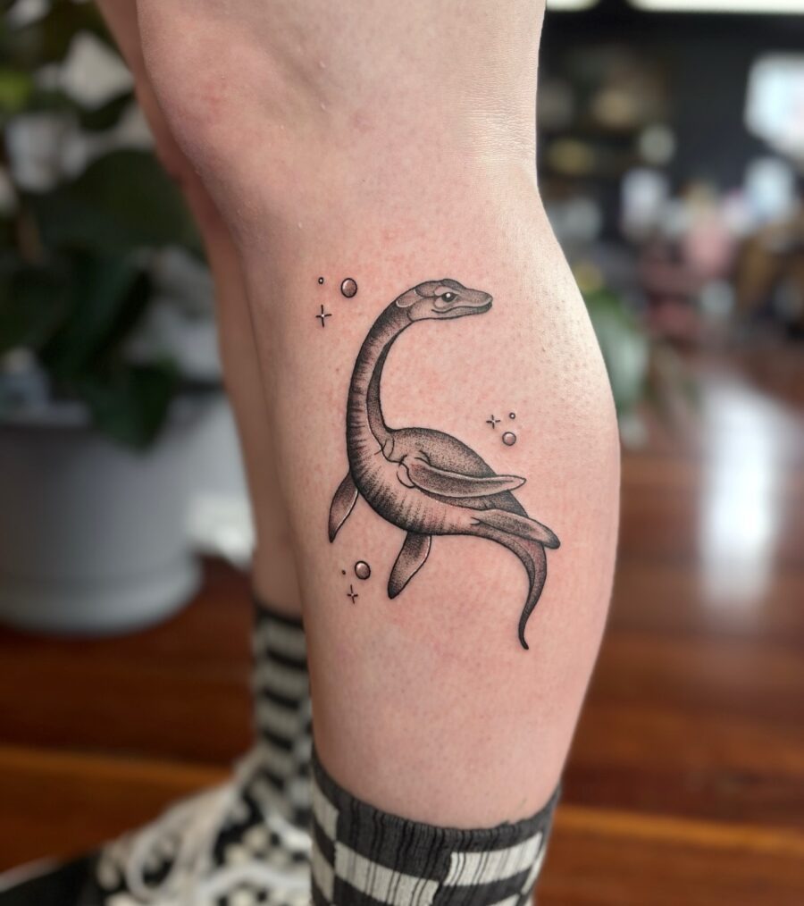 Stylish Loch Ness Monster Tattoo in Black Ink Tattoo Design
