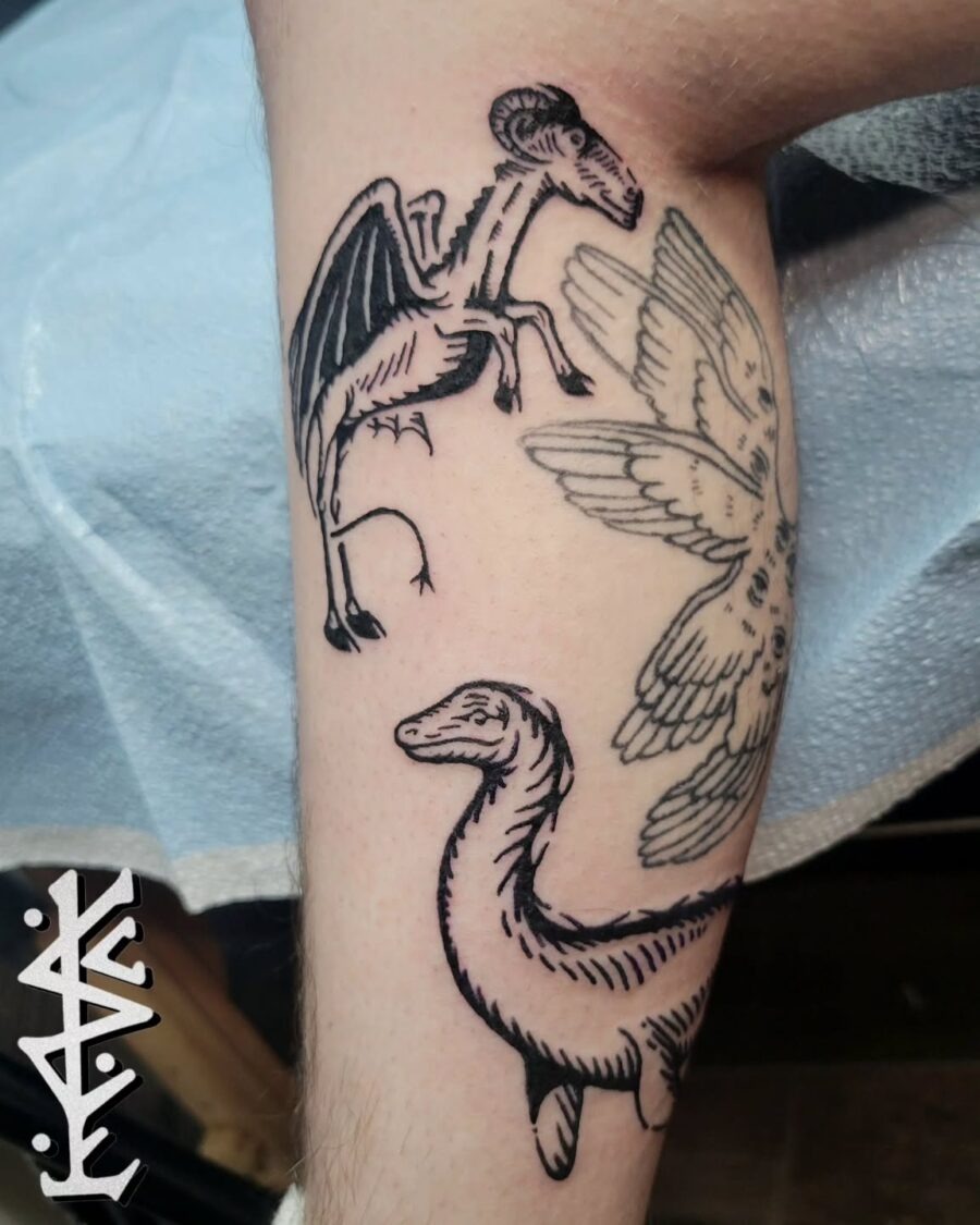 Unique Loch Ness Monster and Winged Creatures Tattoo Tattoo Design