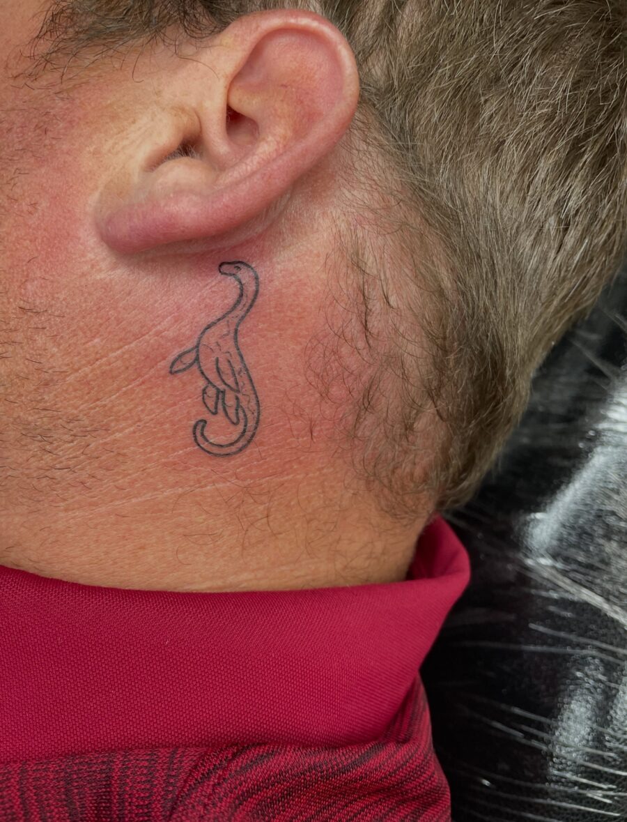 Unique Loch Ness Tattoo on Side of Neck Tattoo Design