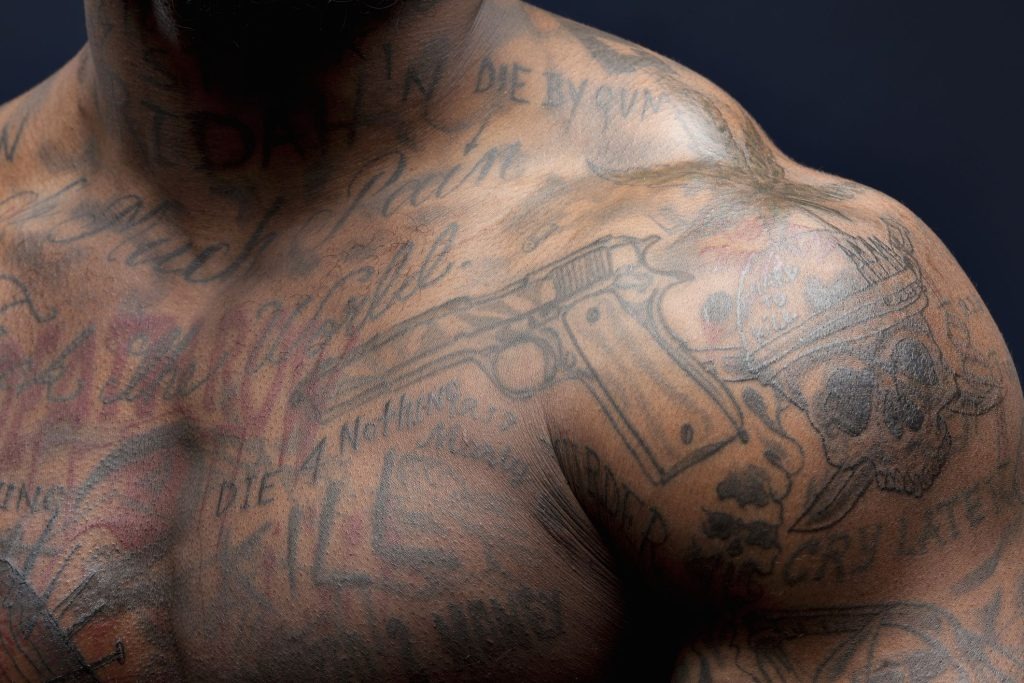 Bold Shoulder and Chest Design Tattoo Design