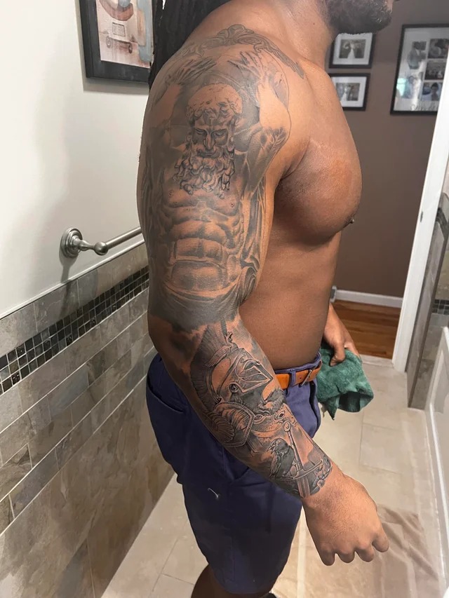 The Majestic Sleeve - Power and Spirituality Tattoo Design