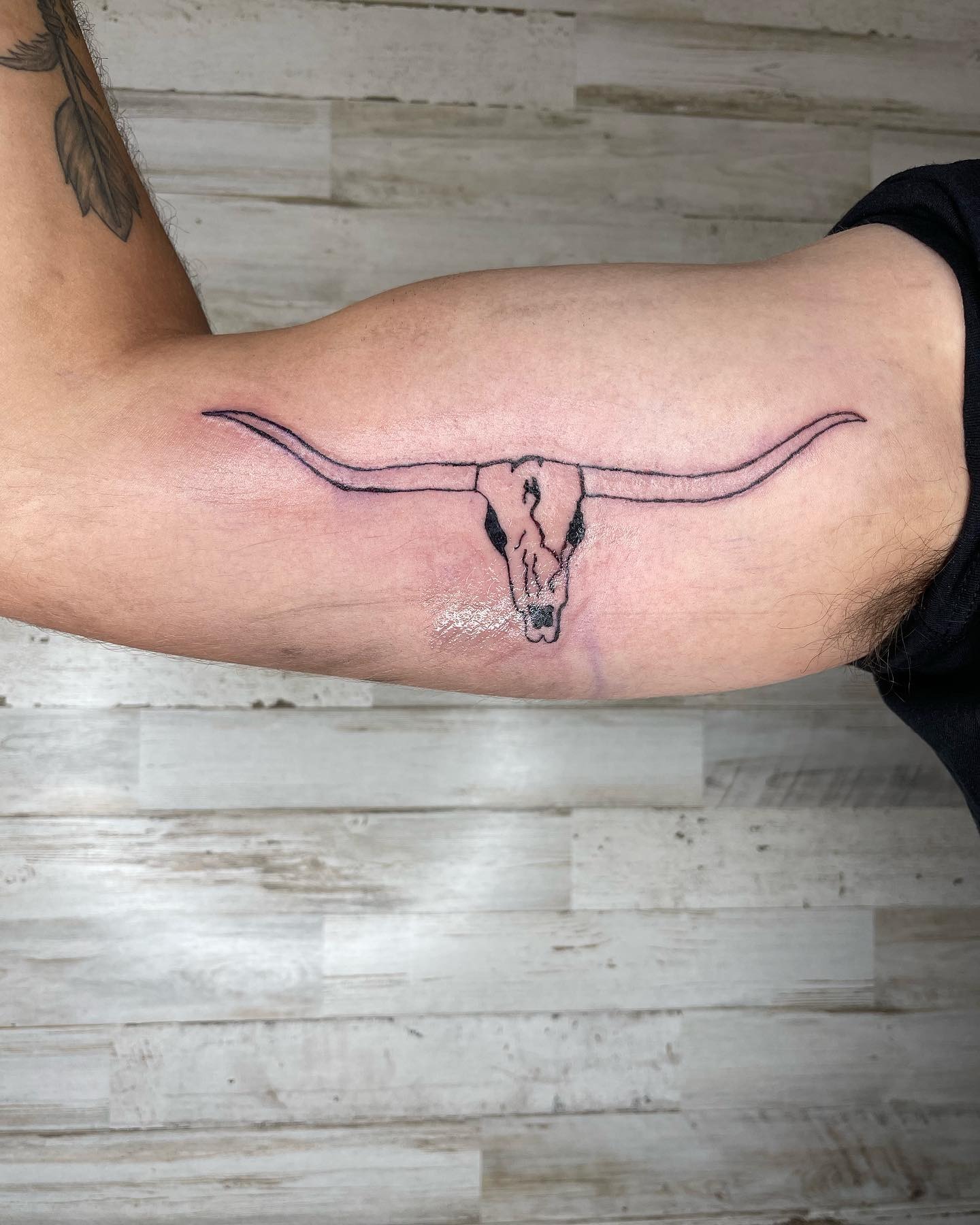 Minimal Longhorn Skull Inner Arm Tattoo Tattoo Design
