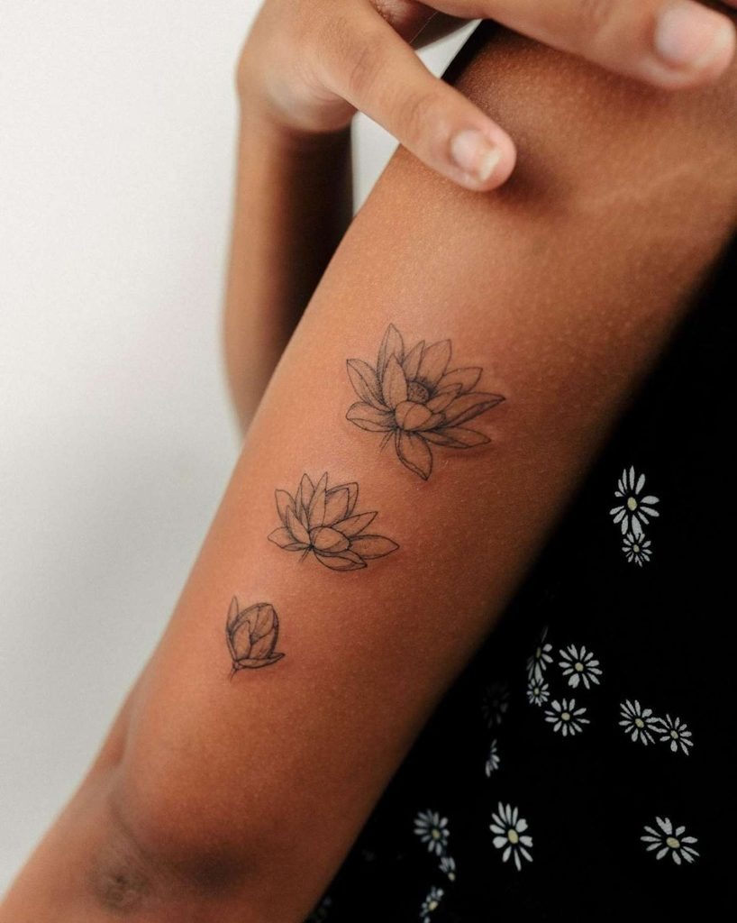 Delicate Three-Lotus Tattoo Design on the Arm Tattoo Design