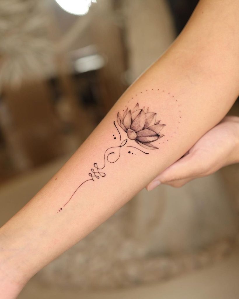 Elegant Forearm Lotus Flower with Linework Tattoo Design