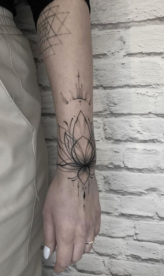 Geometric Lotus Tattoo on the Wrist Tattoo Design
