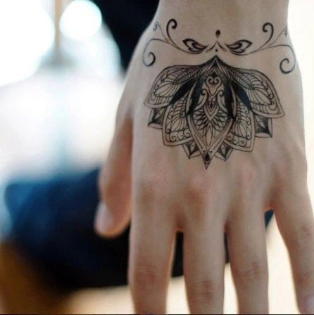 Ornate Lotus Tattoo on the Hand Tattoo Design