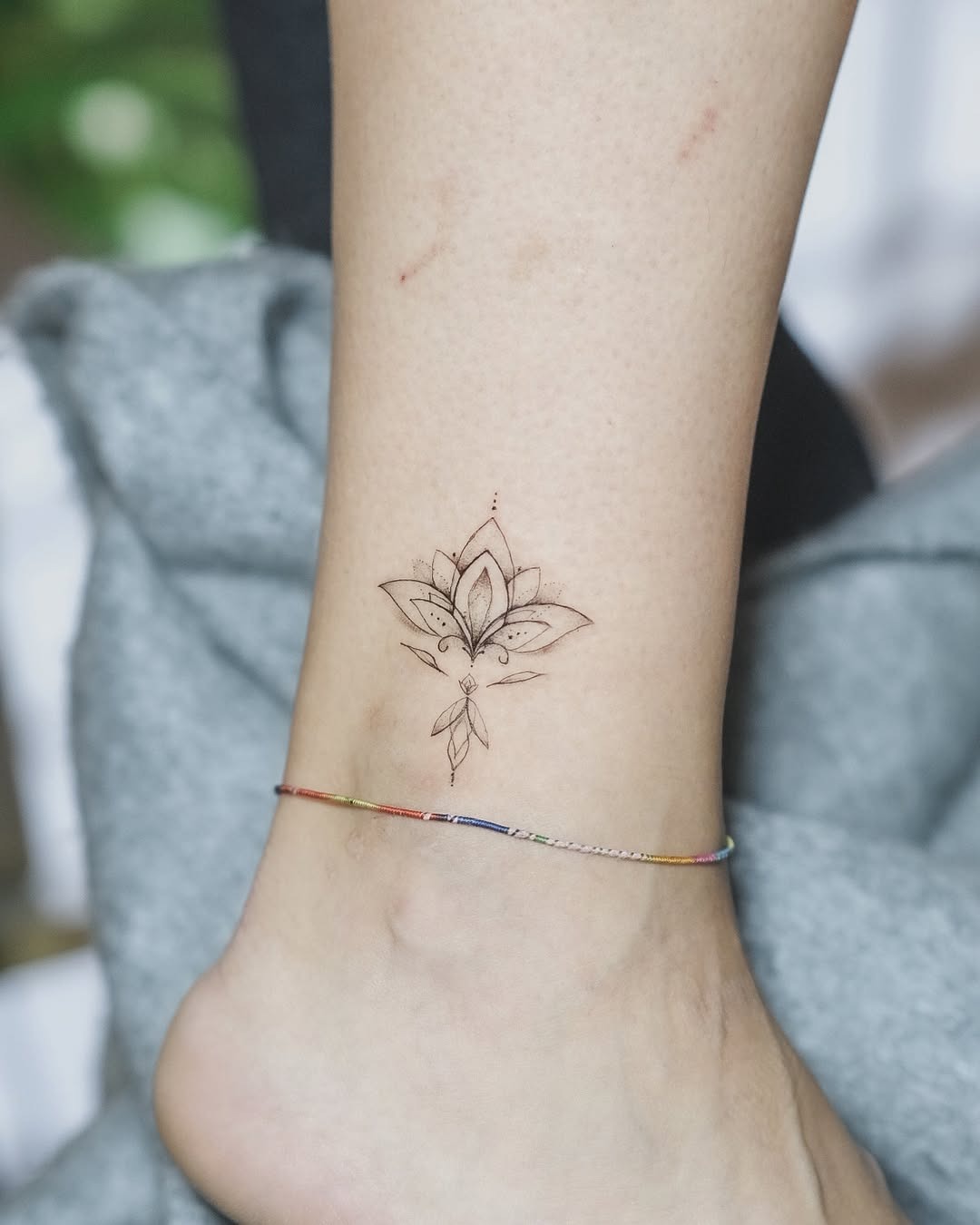 Delicate lotus tattoo design with pastel hues Tattoo Design