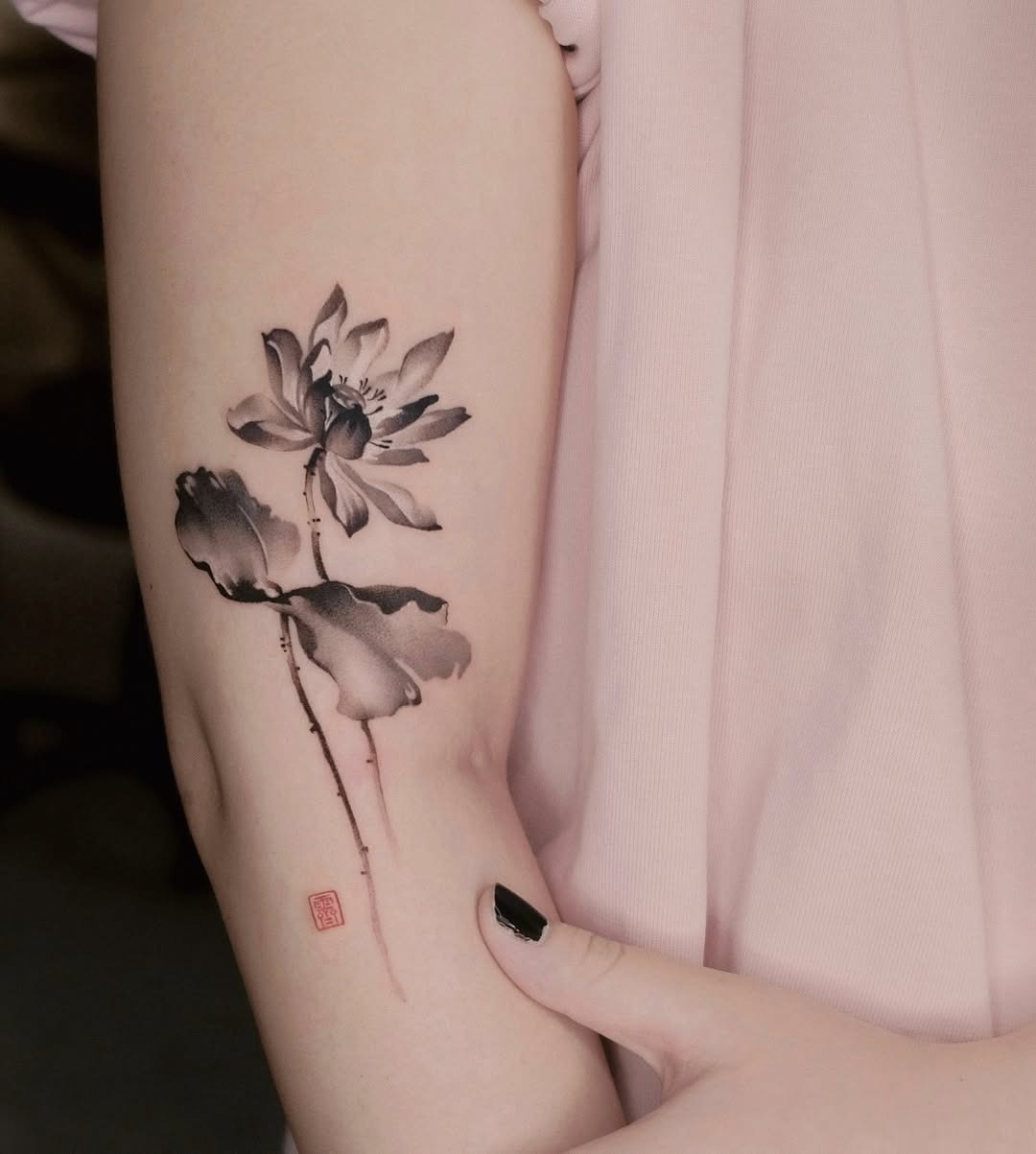 Elegant lotus tattoo design along the neck Tattoo Design