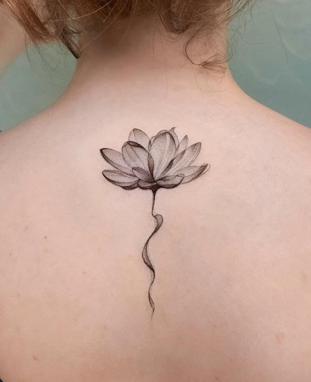 Elegant lotus tattoo with delicate detailing Tattoo Design
