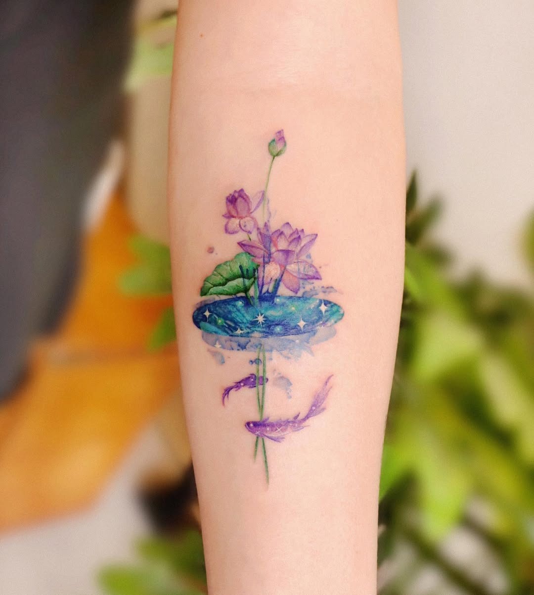 Elegant lotus tattoo with whimsical ribbon details Tattoo Design