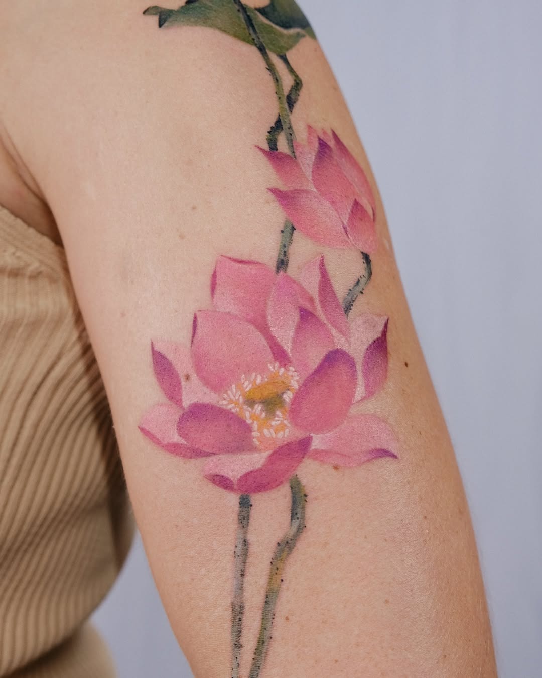 Elegant pink lotus for serene body art Tattoo Design