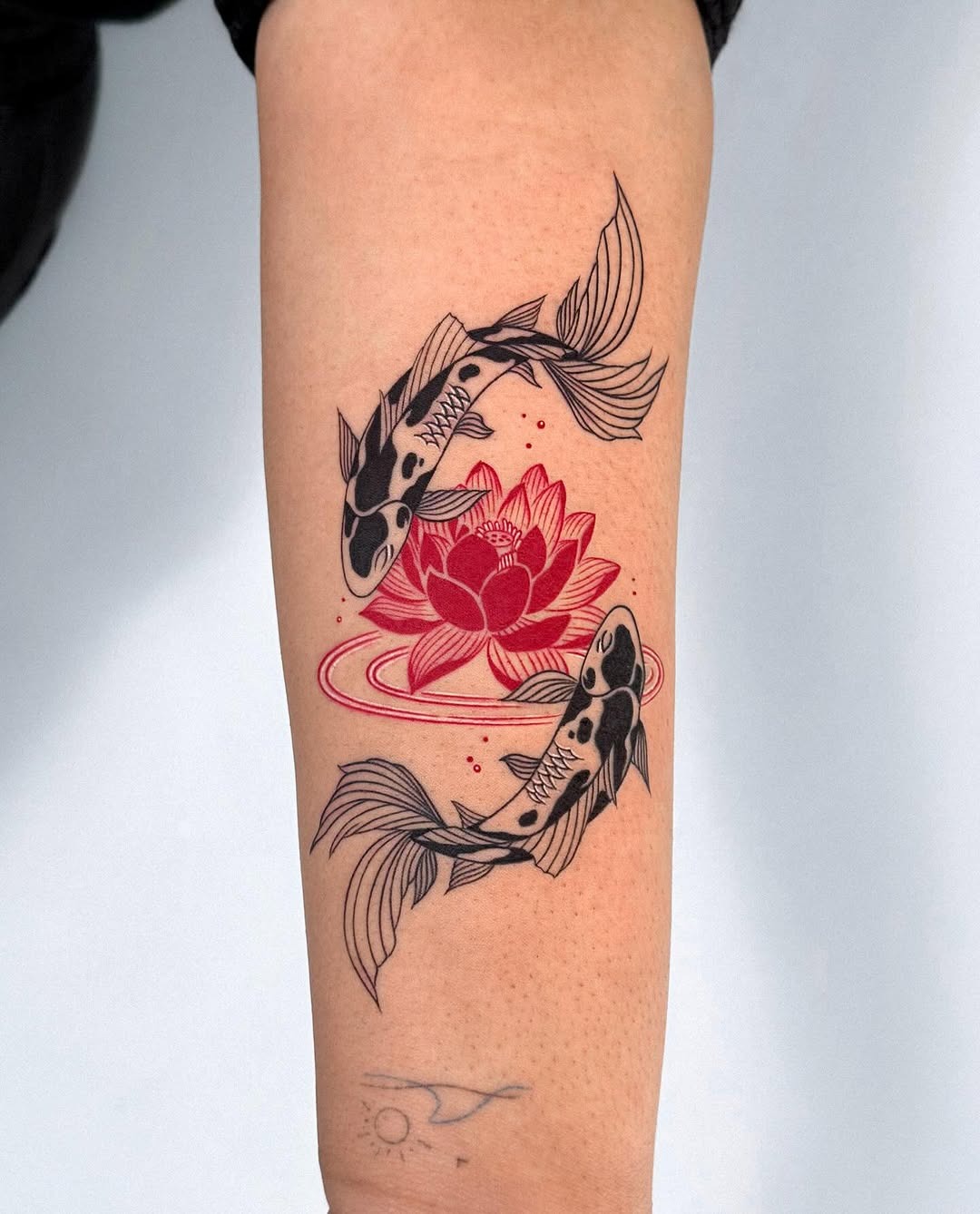 Koi fish with vibrant lotus floral design Tattoo Design