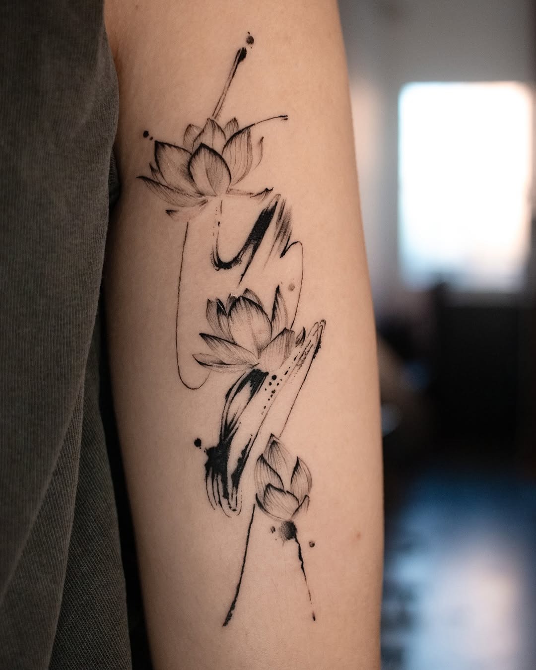 Minimalist lotus tattoo on ankle with elegance Tattoo Design
