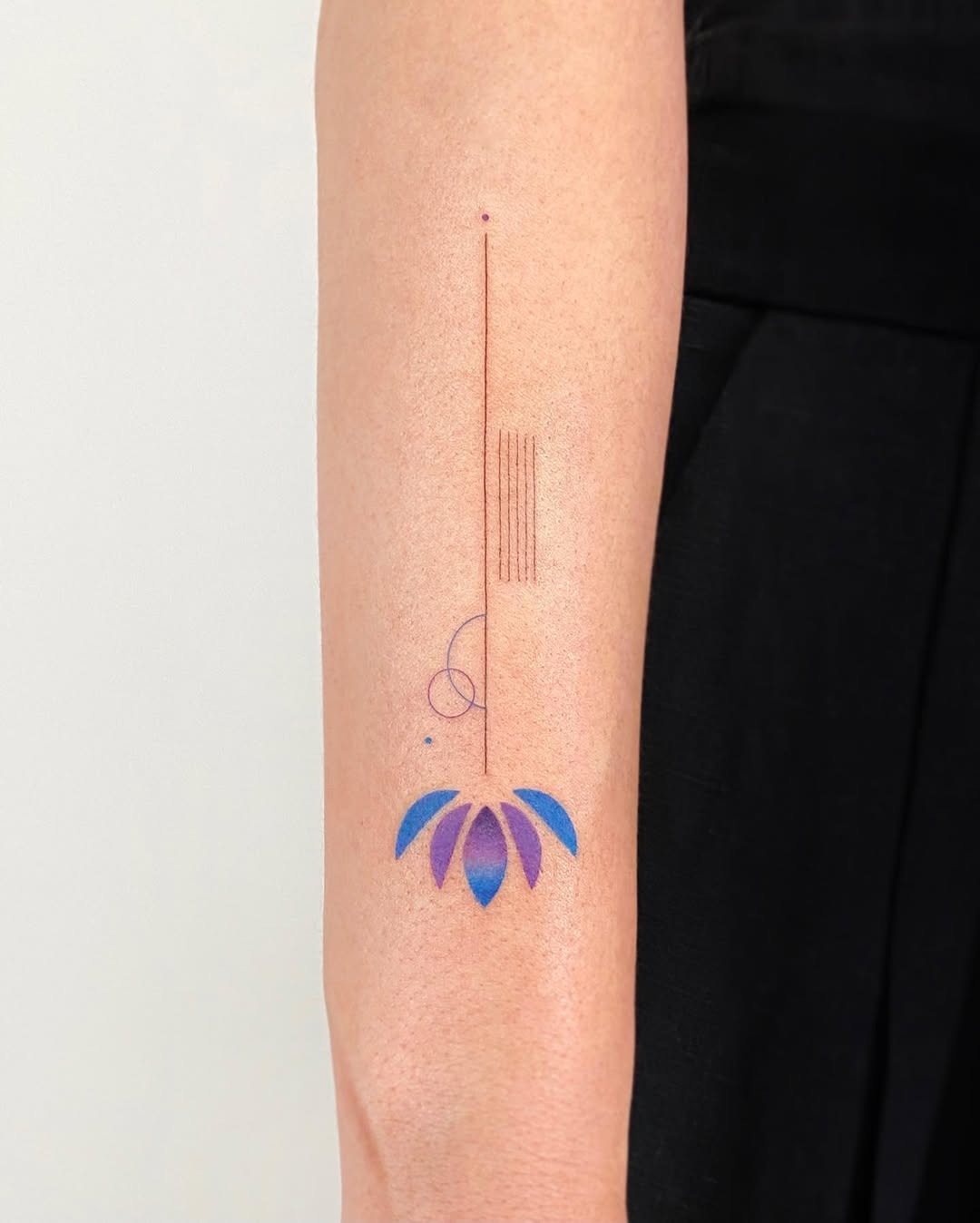 Minimalistic colorful lotus tattoo design Tattoo Design