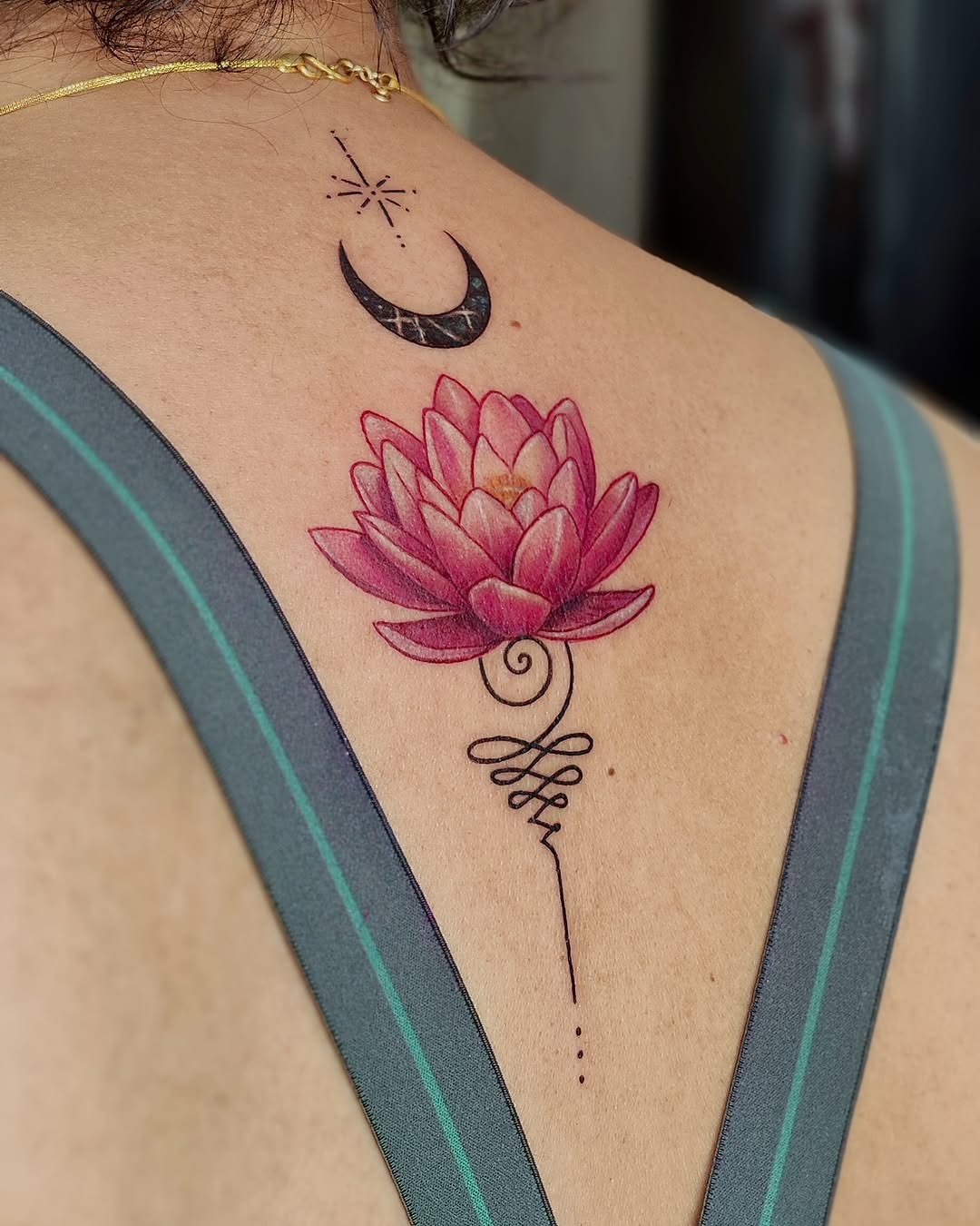 Stunning lotus tattoo with a celestial vibe Tattoo Design