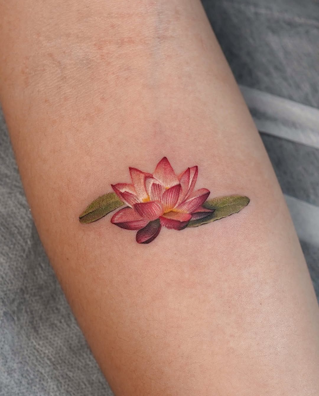 Stunning Lotus Tattoo with Water Lilies Design Tattoo Design